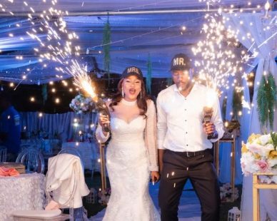 Couple celebrating with sparklers
