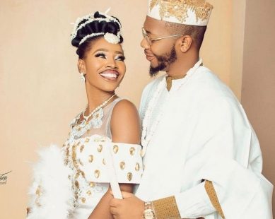 Couple in white traditional outfits