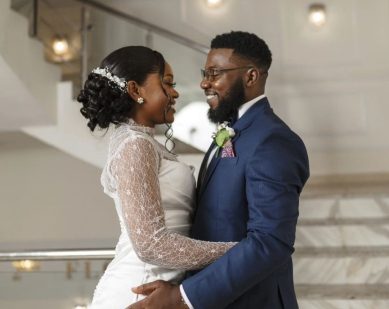 Bride and groom in navy blue attire